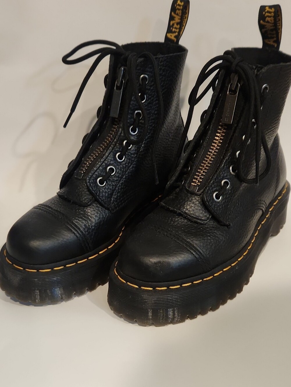 Dr. Martens Black Pebbled Leather Platform Combat Boots with Yellow Stitching
